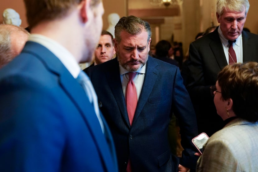 Sen. Ted Cruz, R-Texas, speaks with members of the press after Senate Republican leadership...