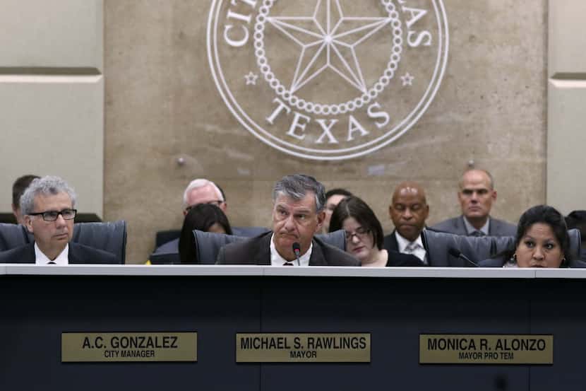 Mayor Mike Rawlings and other city leaders must decide on hiring more Dallas police and...
