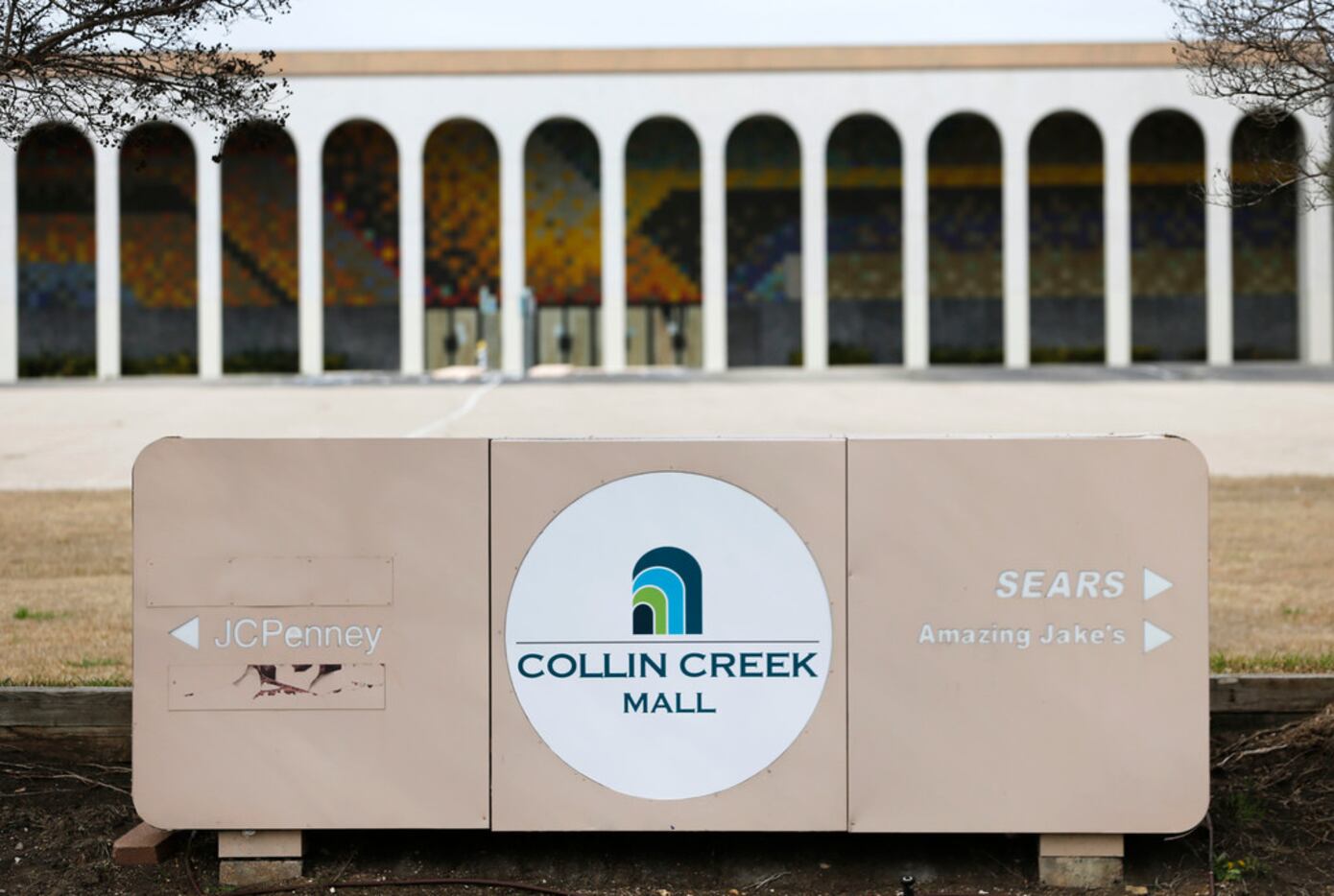 The Collin Creek Mall sign in front of what once was a Macy's department store.