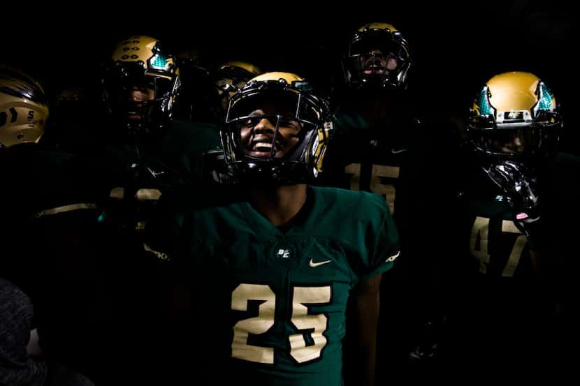 DeSoto football players prepare to take the field before their game against Southlake...