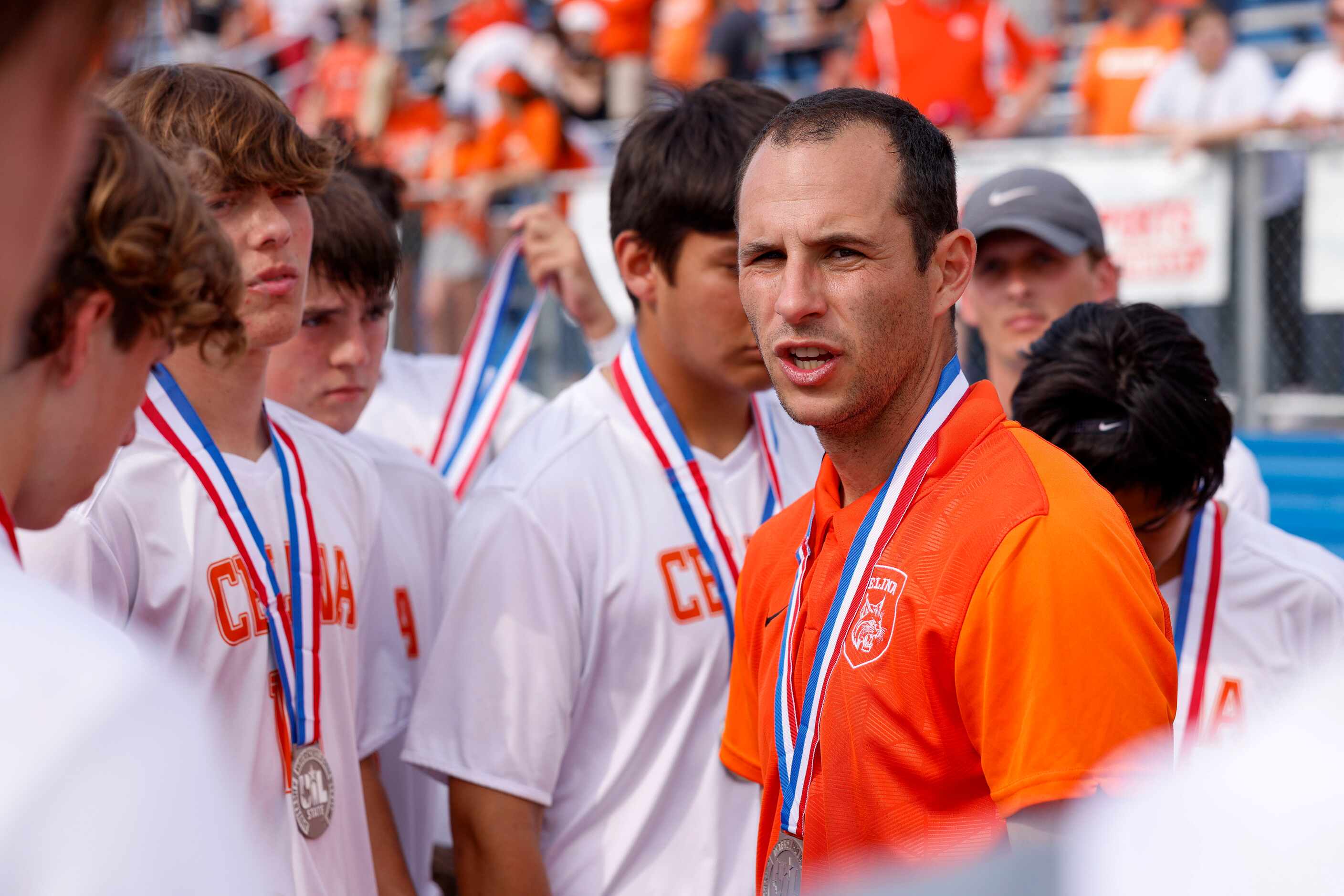 Celina head coach Cody Moles speaks with his team after the Class 4A boys soccer state...