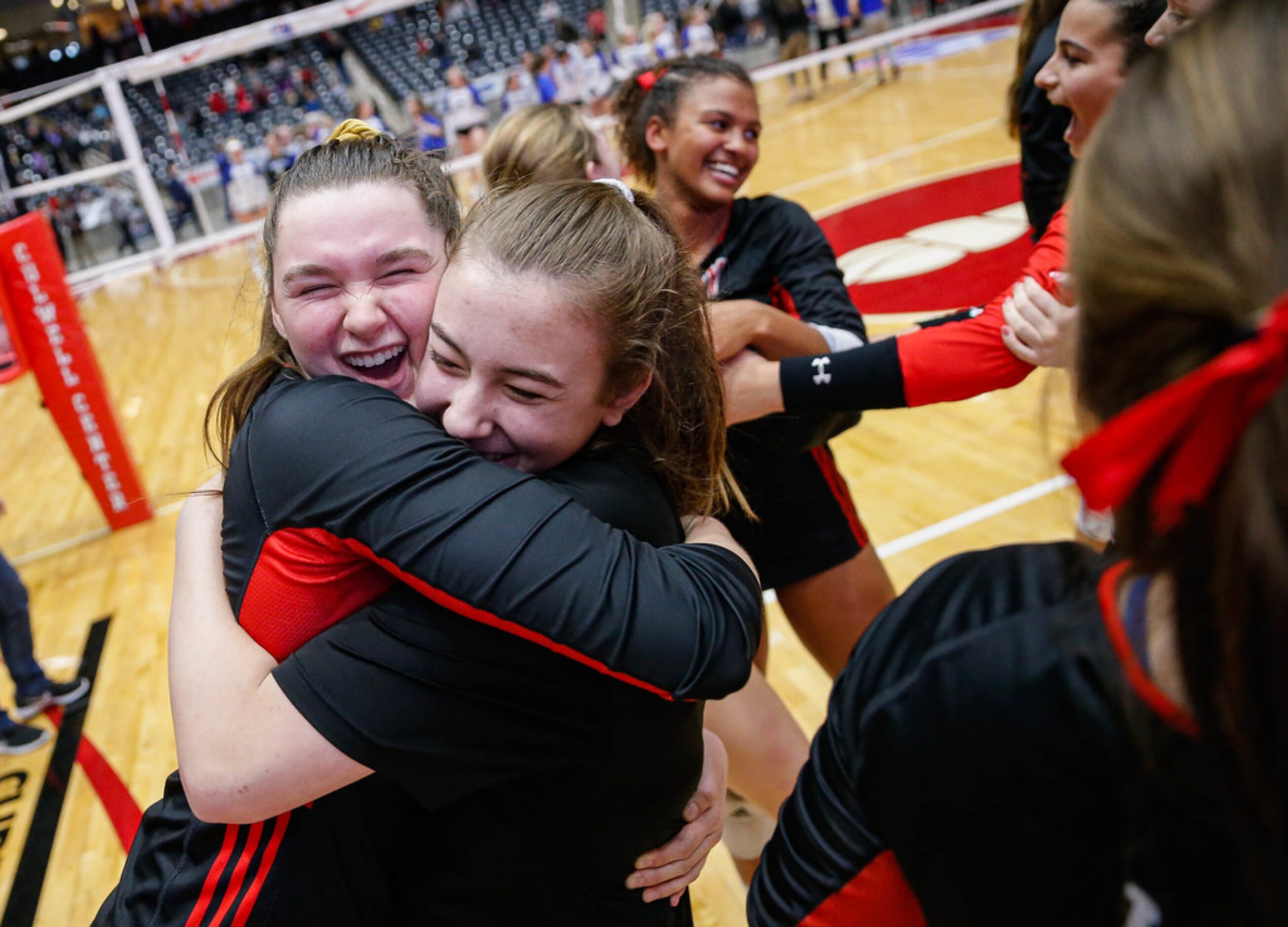 LovejoyÃs Lexie Collins (19) (left) celebrates with her team after beating Friendswood in...