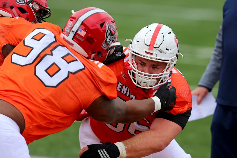 North Team defensive tackles Harrison Phillips (66), of Stanford, and B.J. Hill (98), of NC...