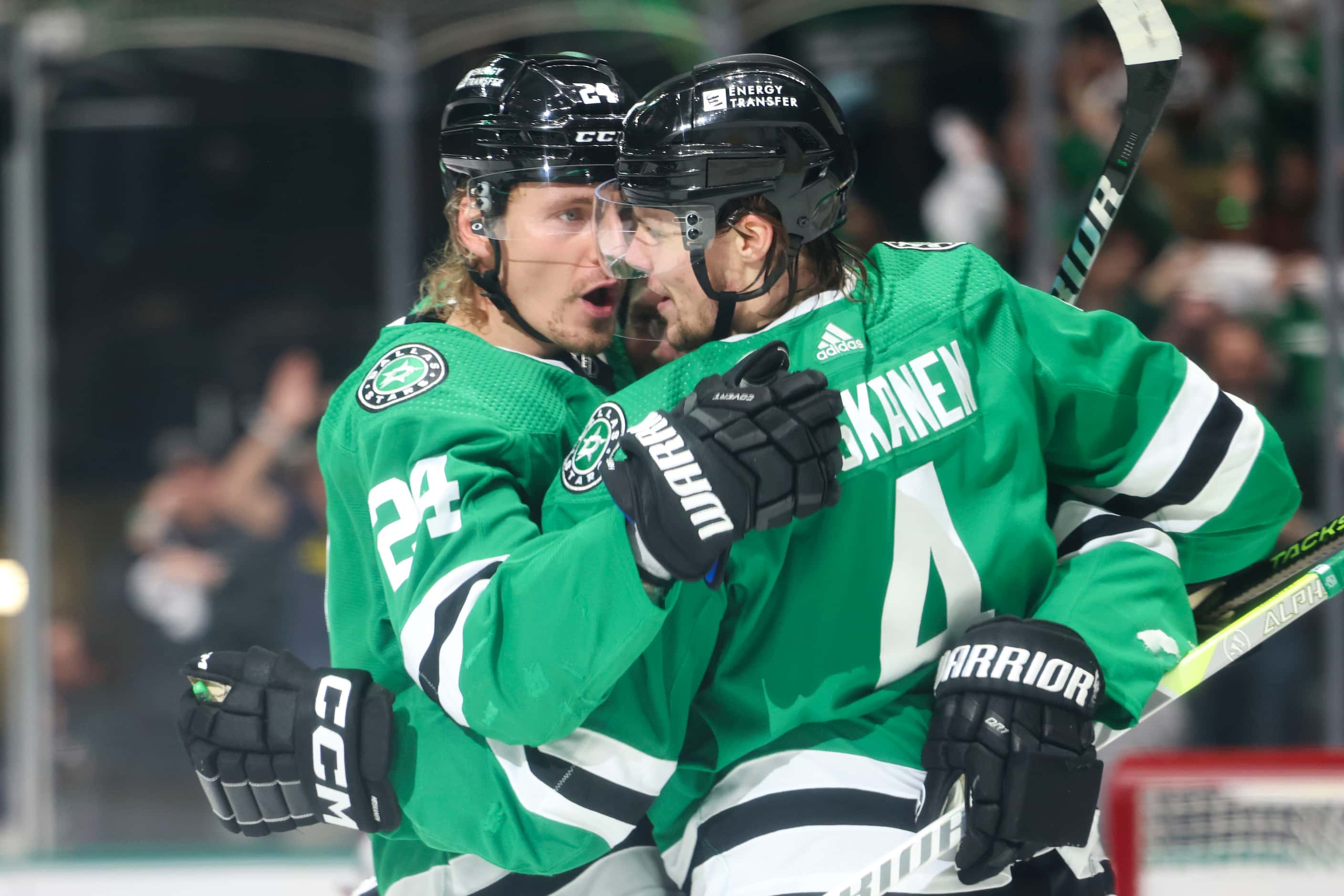 Dallas Stars center Roope Hintz (left) cheers after a goal scored by defenseman Miro...