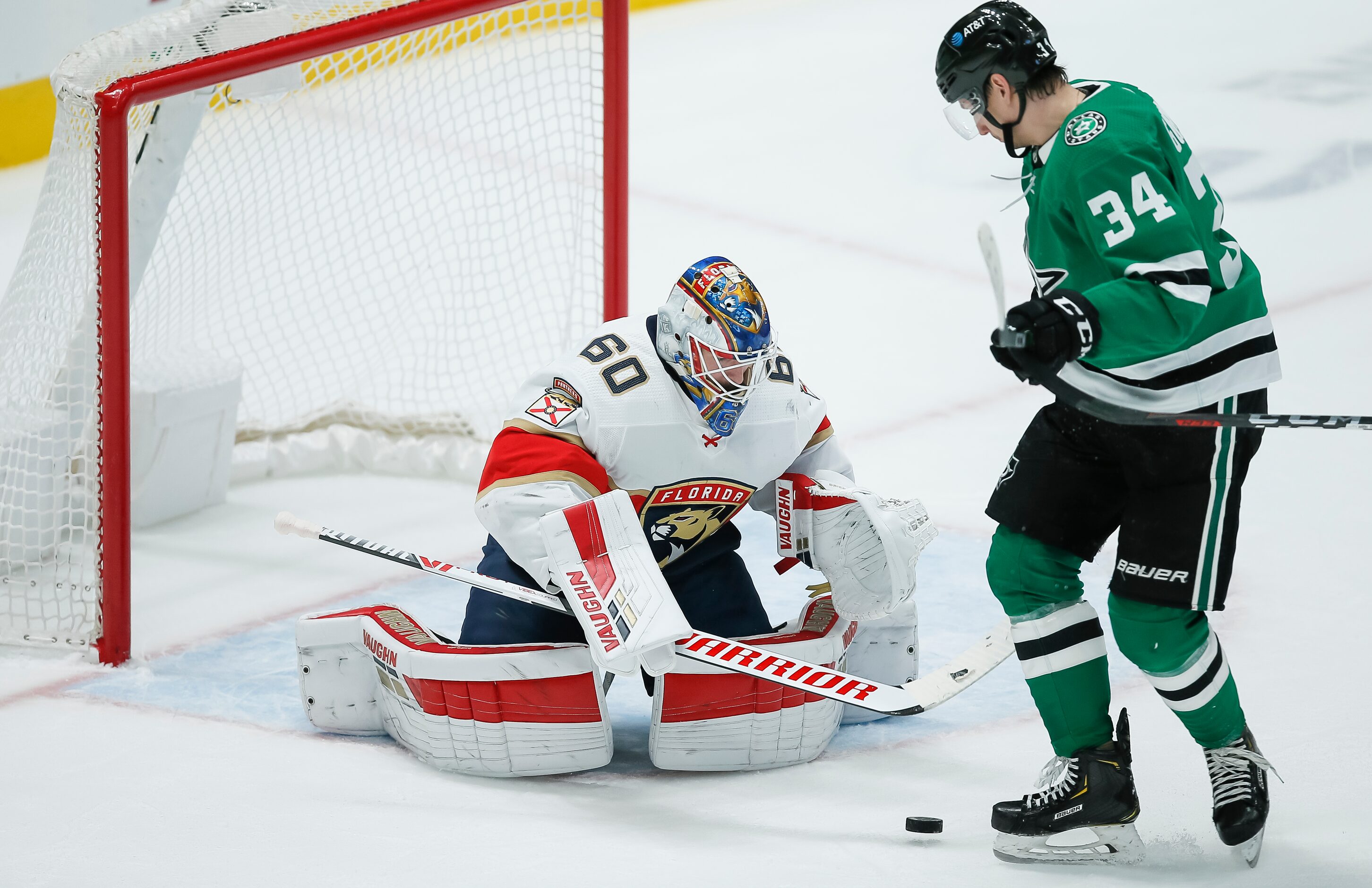 Dallas Stars forward Denis Gurianov (34) looks for the rebound off of Florida Panthers...