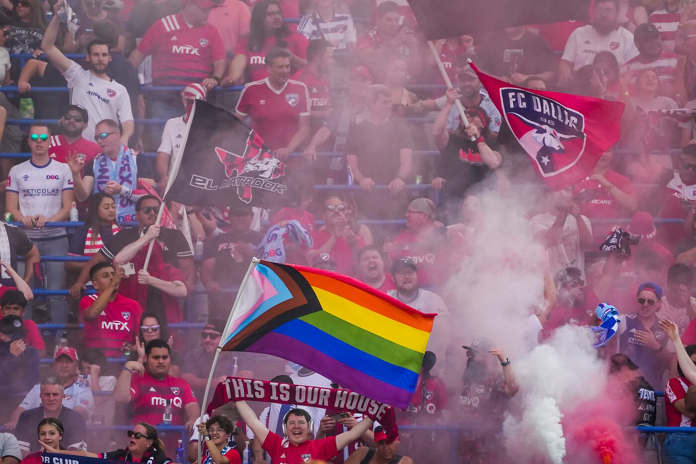 FC Dallas supporters celebrate a goal during the first half of an MLS soccer match against...