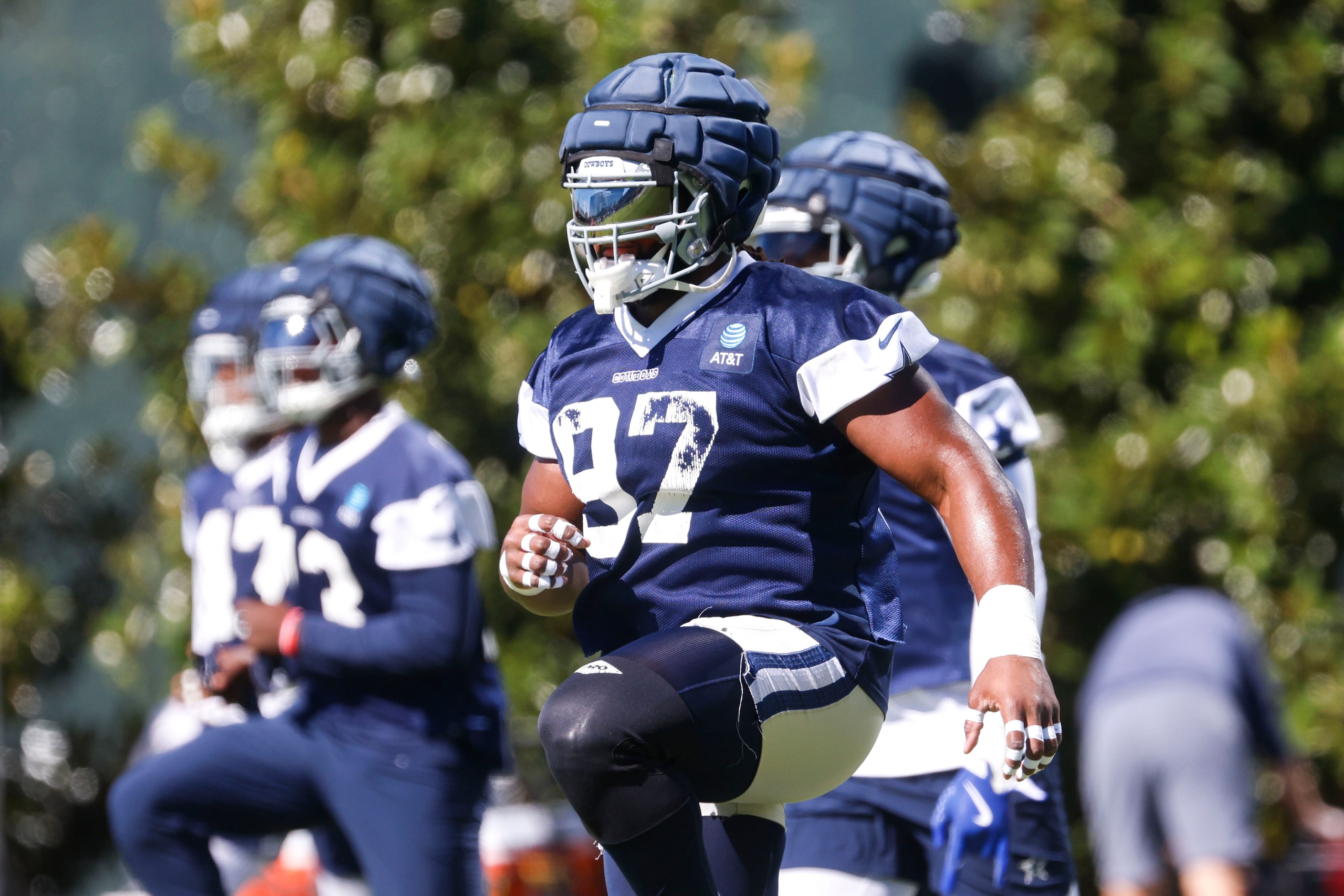 Dallas Cowboys defensive tackle Osa Odighizuwa (97) warms up during a team practice on...