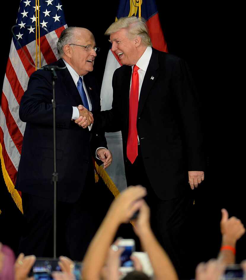Former New York City Mayor Rudy Giuliani, with Donald Trump in 2016, will be in Farmers...