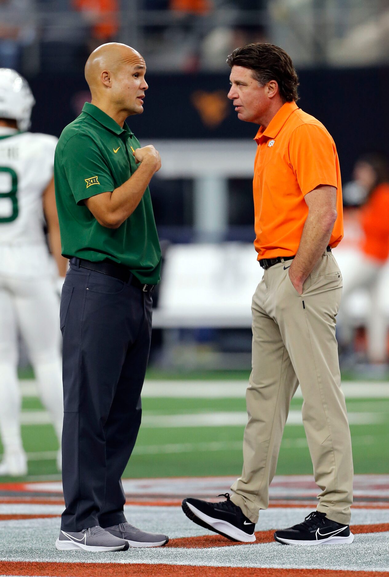 Baylor Bears head coach Dave Aranda and Oklahoma State Cowboys head coach Mike Gundy take at...