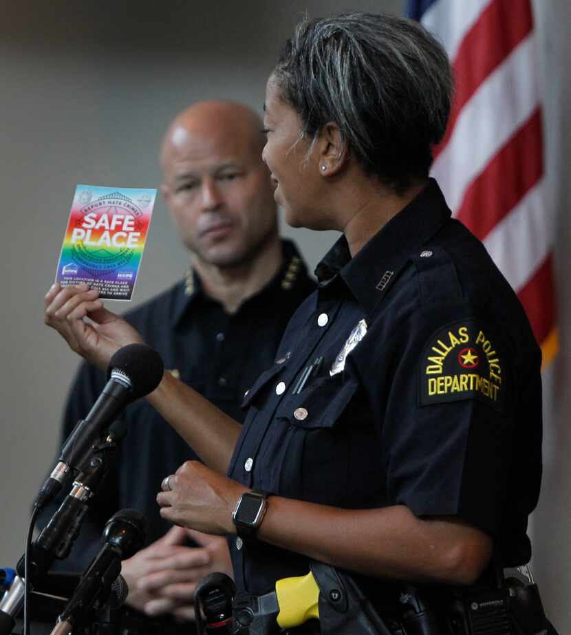Dallas Police Department's new LGBTQ+ liaison, officer Megan Thomas, displays the Safe Place...