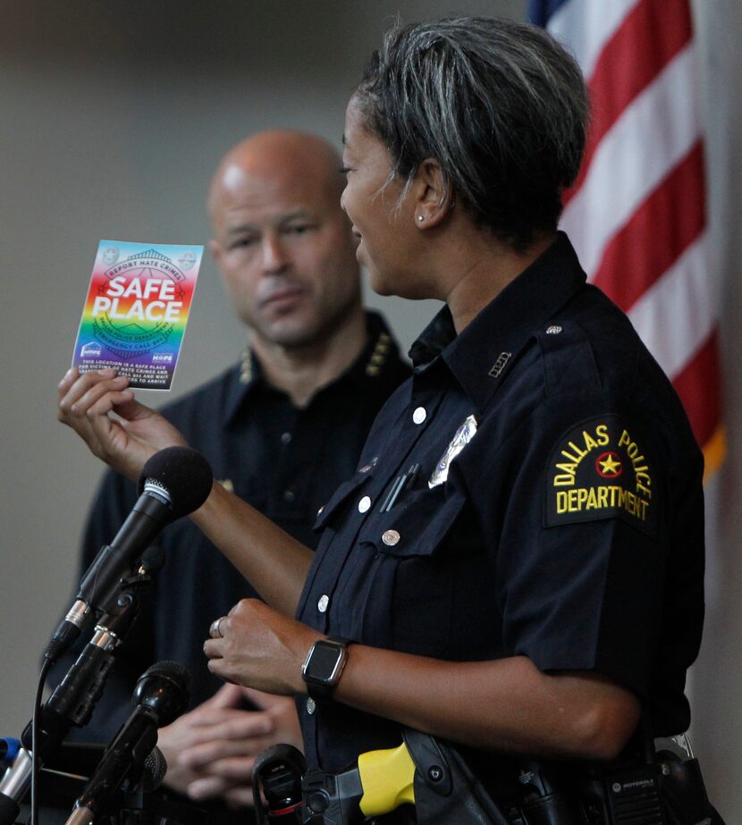 Dallas Police Department's new LGBTQ+ liaison, officer Megan Thomas, displays the Safe Place...