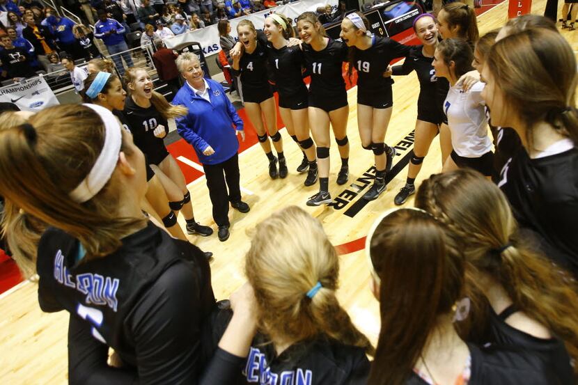 Hebron head coach Karin Keeney talks with her team after defeating Comal Canyon during their...