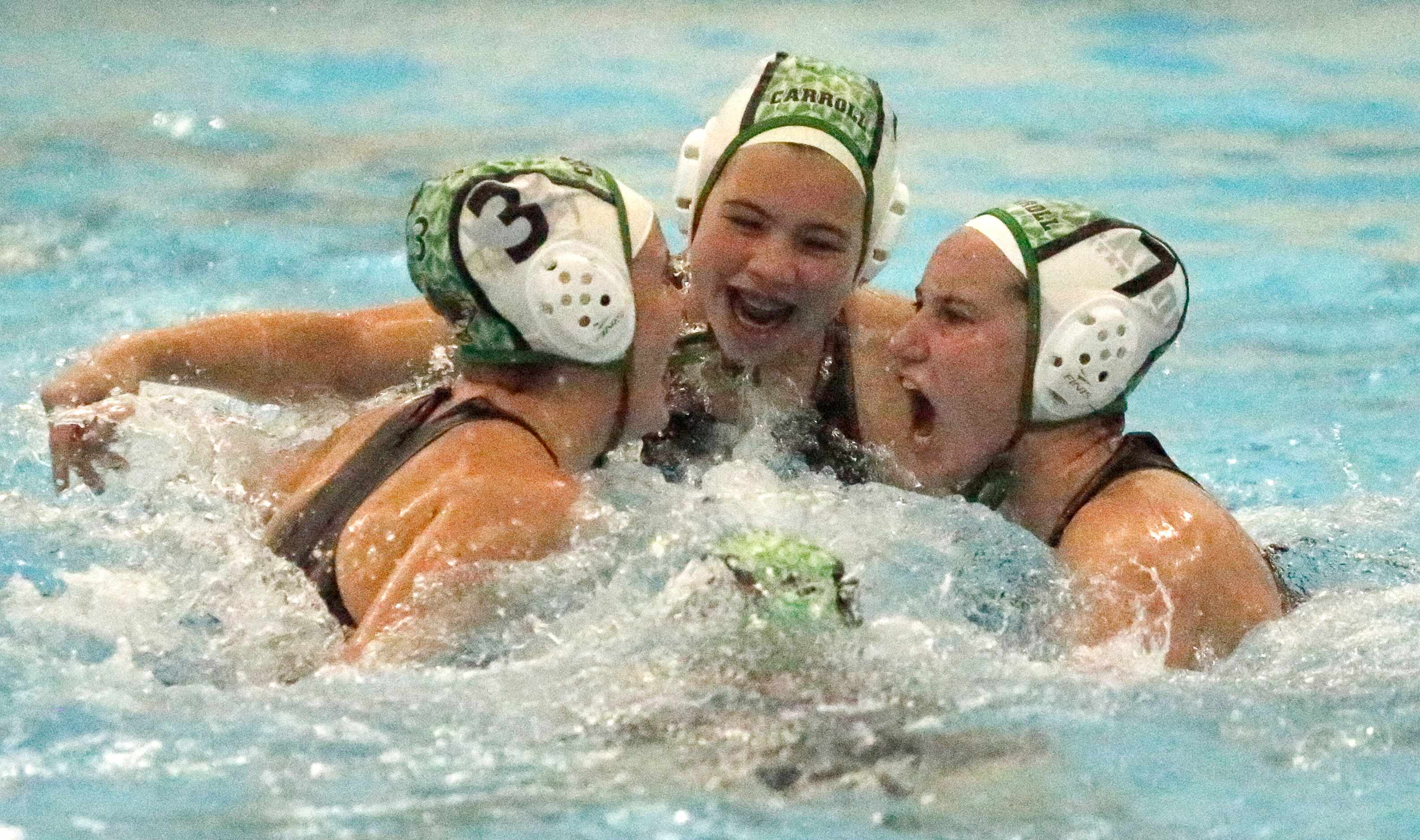 Southlake’s Kamdyn Geisel (3), Maile Farden (4), and Sydney Rubin (7) celebrate their...