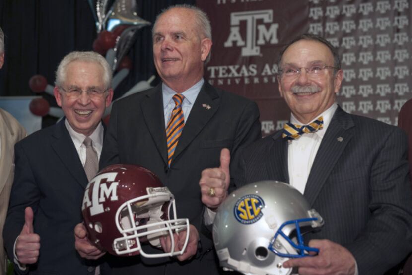 Southeastern Conference commissioner Mike Slive (left), conference leadership chairman and...