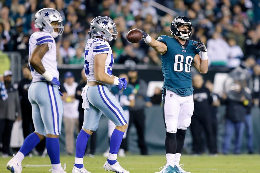 Philadelphia Eagles tight end Dallas Goedert (88) signals first down after being tackled by...