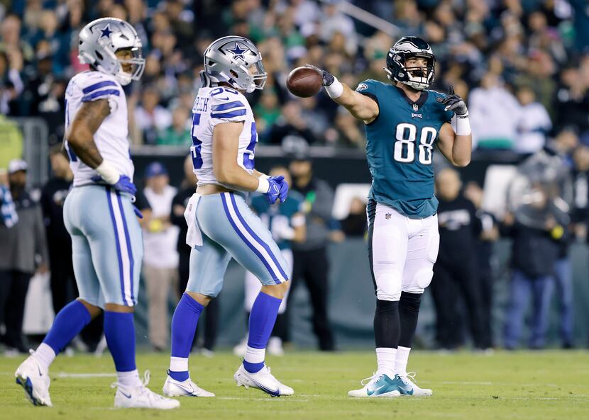 Philadelphia Eagles tight end Dallas Goedert (88) signals first down after being tackled by...