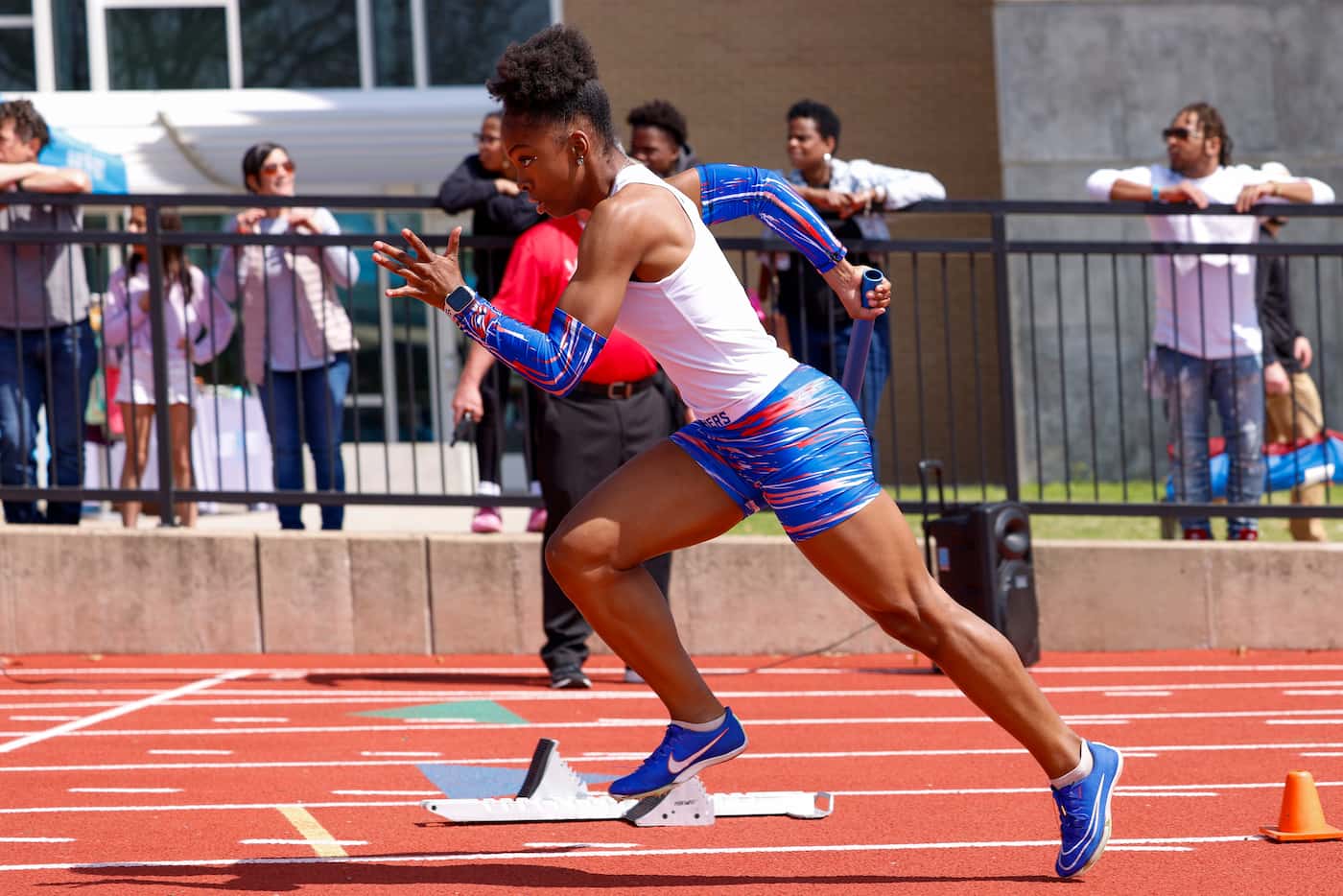 Duncanville’s Ashley Lister starts the girls 4x100 meter relay during the Jesuit-Sheaner...