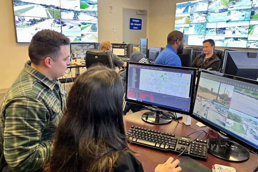 Crews monitor traffic at the city of Arlington Public Works Traffic Management Center to...