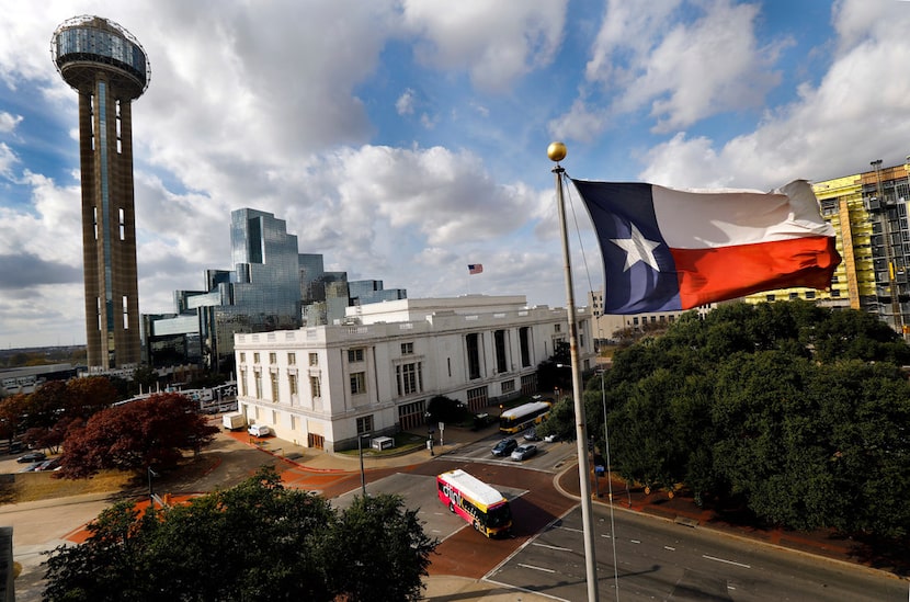 Reunion Tower and the Hyatt Dallas (left), and Union Station (white building) are pictured...