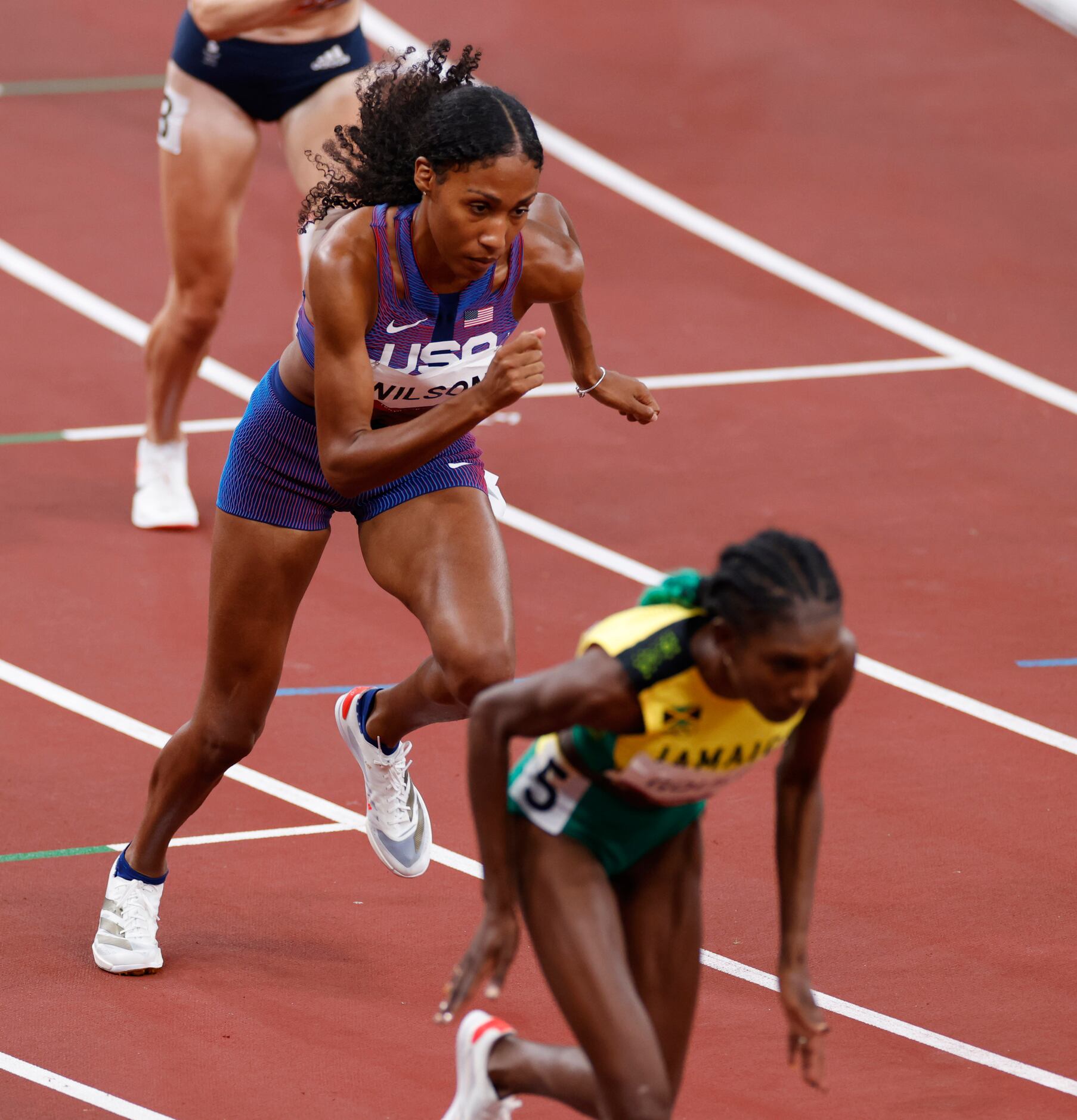USA’s Ajee Wilson competes in the women’s 800 meter semifinal race during the postponed 2020...