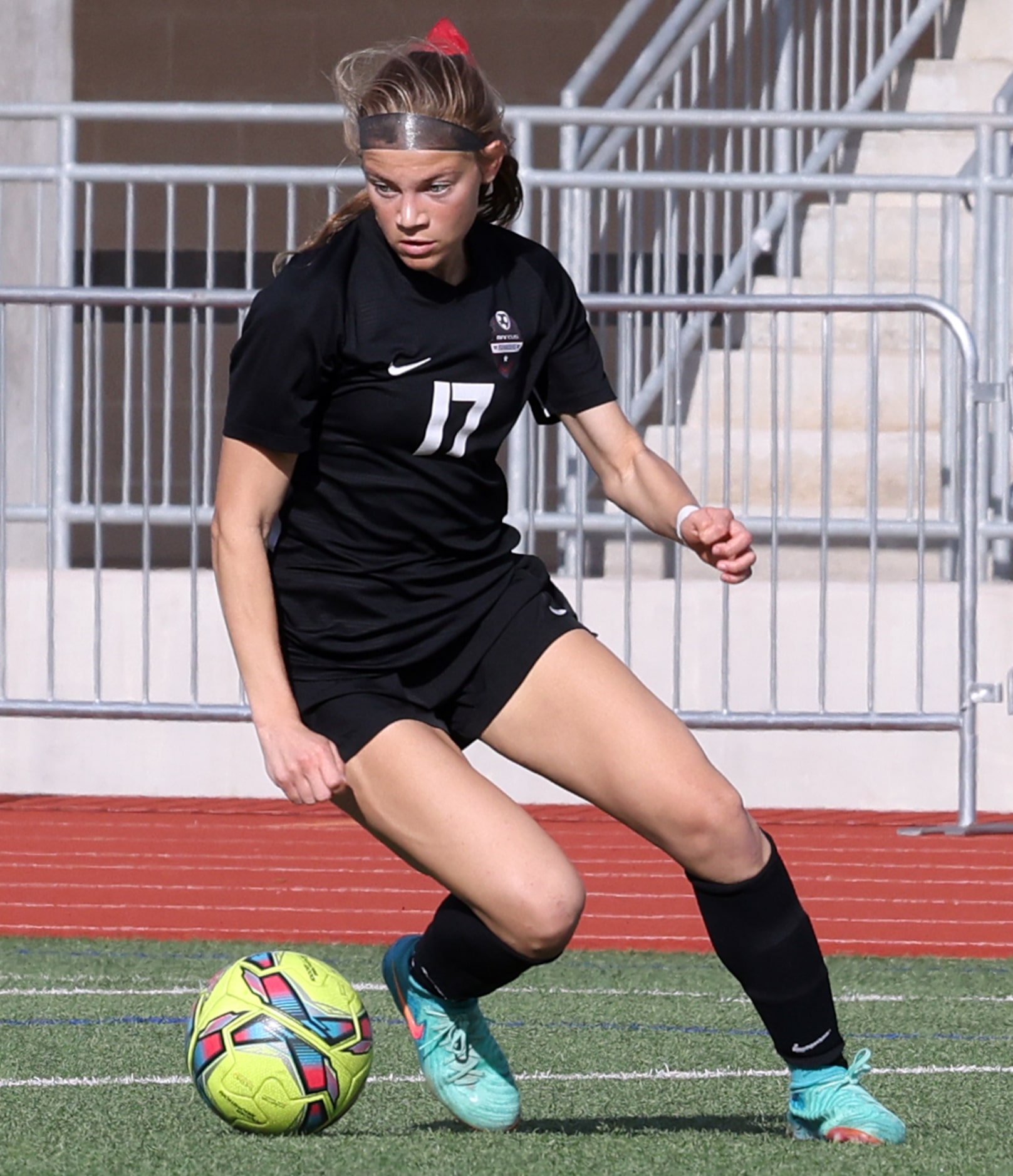 Flower Mound Marcus forward Madi Patterson (17) changes direction as she negotiates a path...