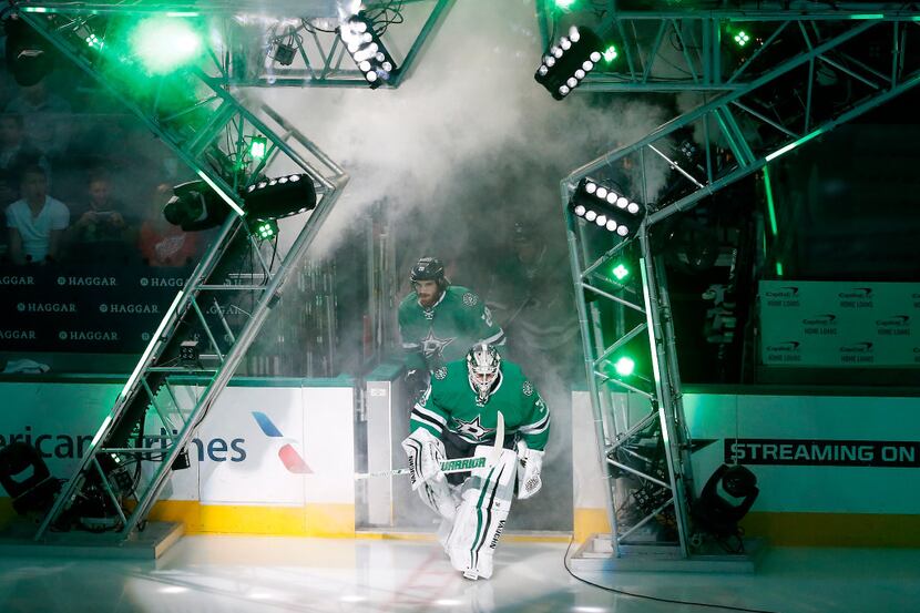 Dallas Stars players take the ice against Detroit Red Wings at American Airlines Center in...