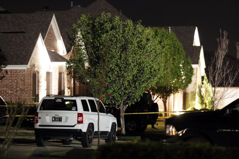 Caution tape surrounds the home of Kaufman County District Attorney Mike McLelland and wife...