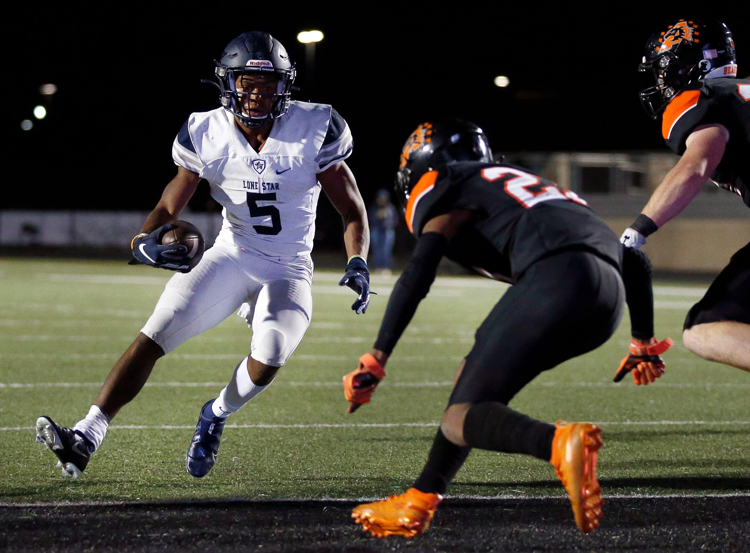 Frisco Lone Star running back Jaden Nixon (5) scores a fourth quarter touchdown against...