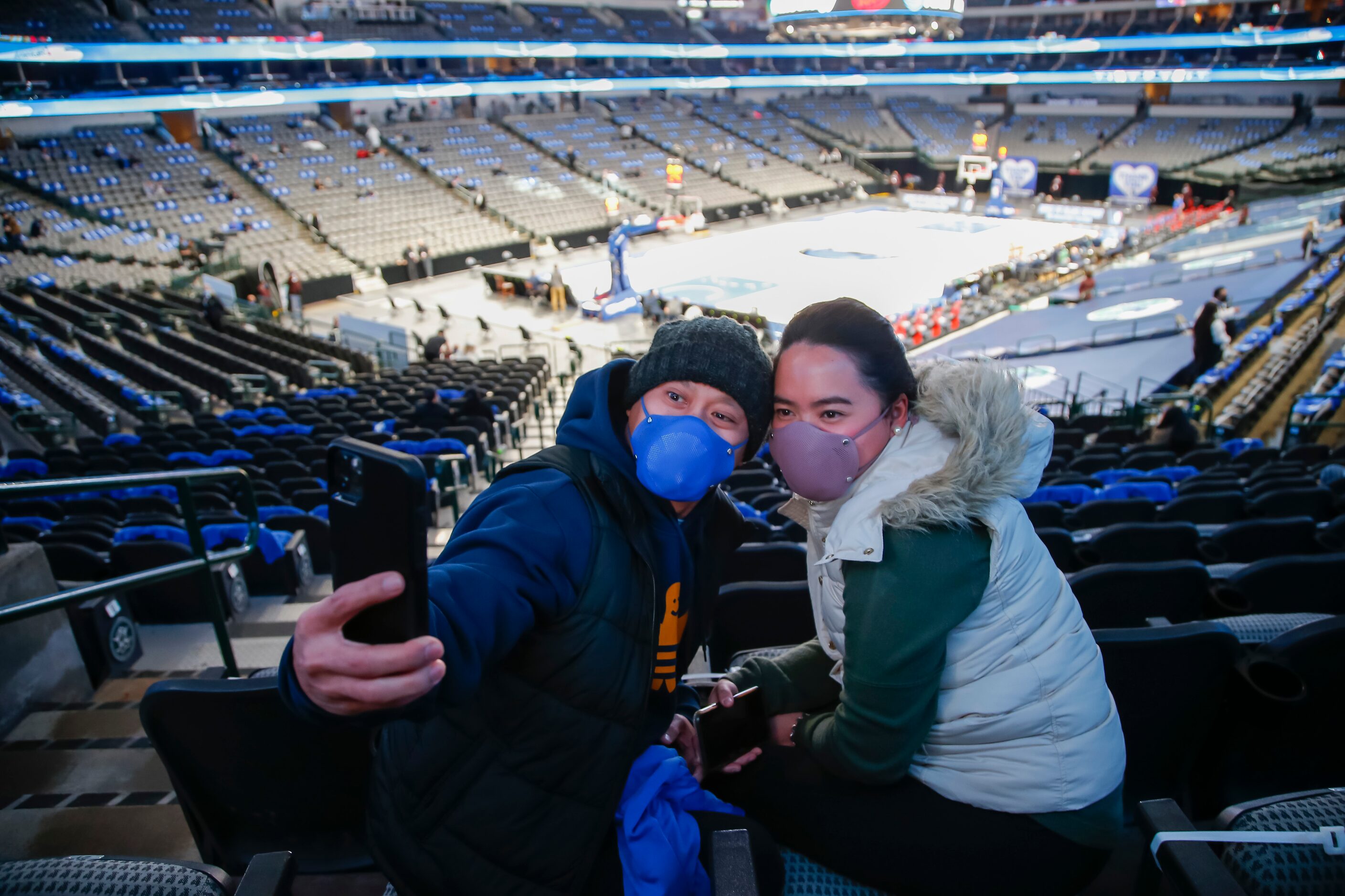 Home health physical therapists Juan Limtengco, left, Chloe Limtengco take a selfie before...