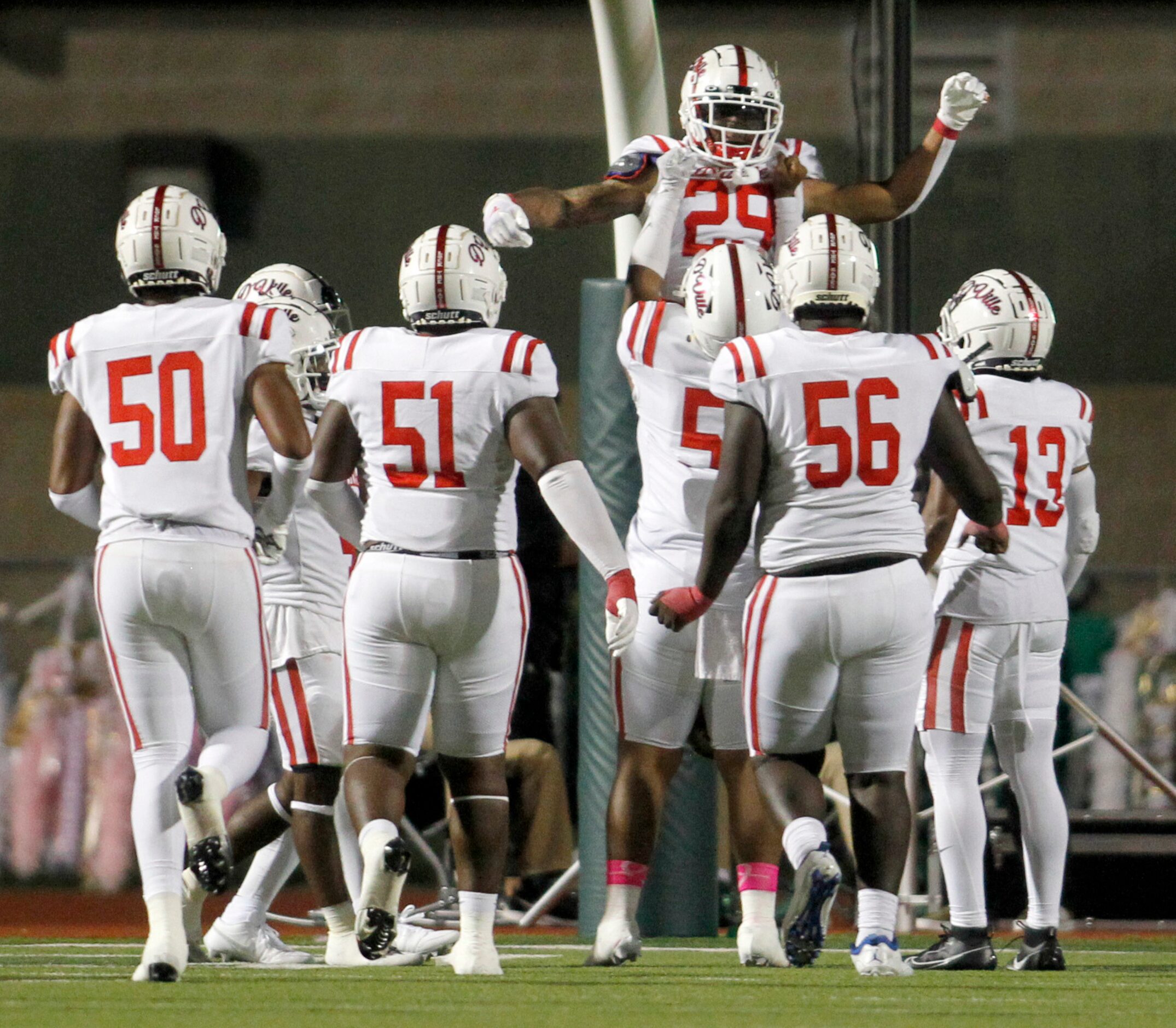 Duncanville running back Caden Durham (29) is raised into the air as he celebrates with...