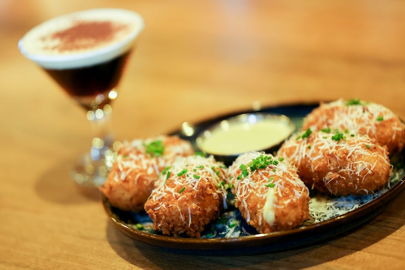 Croquettes with dirty martini dipping sauce are one of the fun snacks expected at Flamant in...