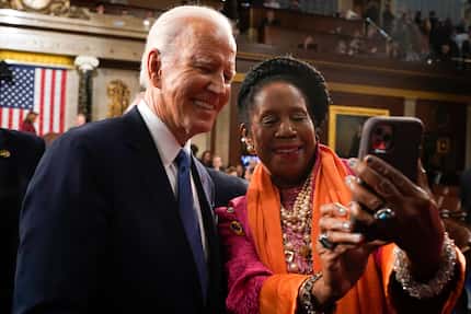 President Joe Biden takes a selfie with Rep. Sheila Jackson Lee, D-Houston, after the State...