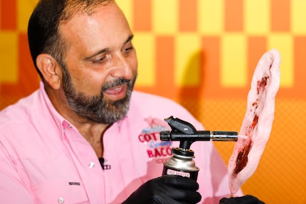 Isaac Rousso torches Cotton Candy Bacon on a Stick at a pre-fair competition in August 2024.