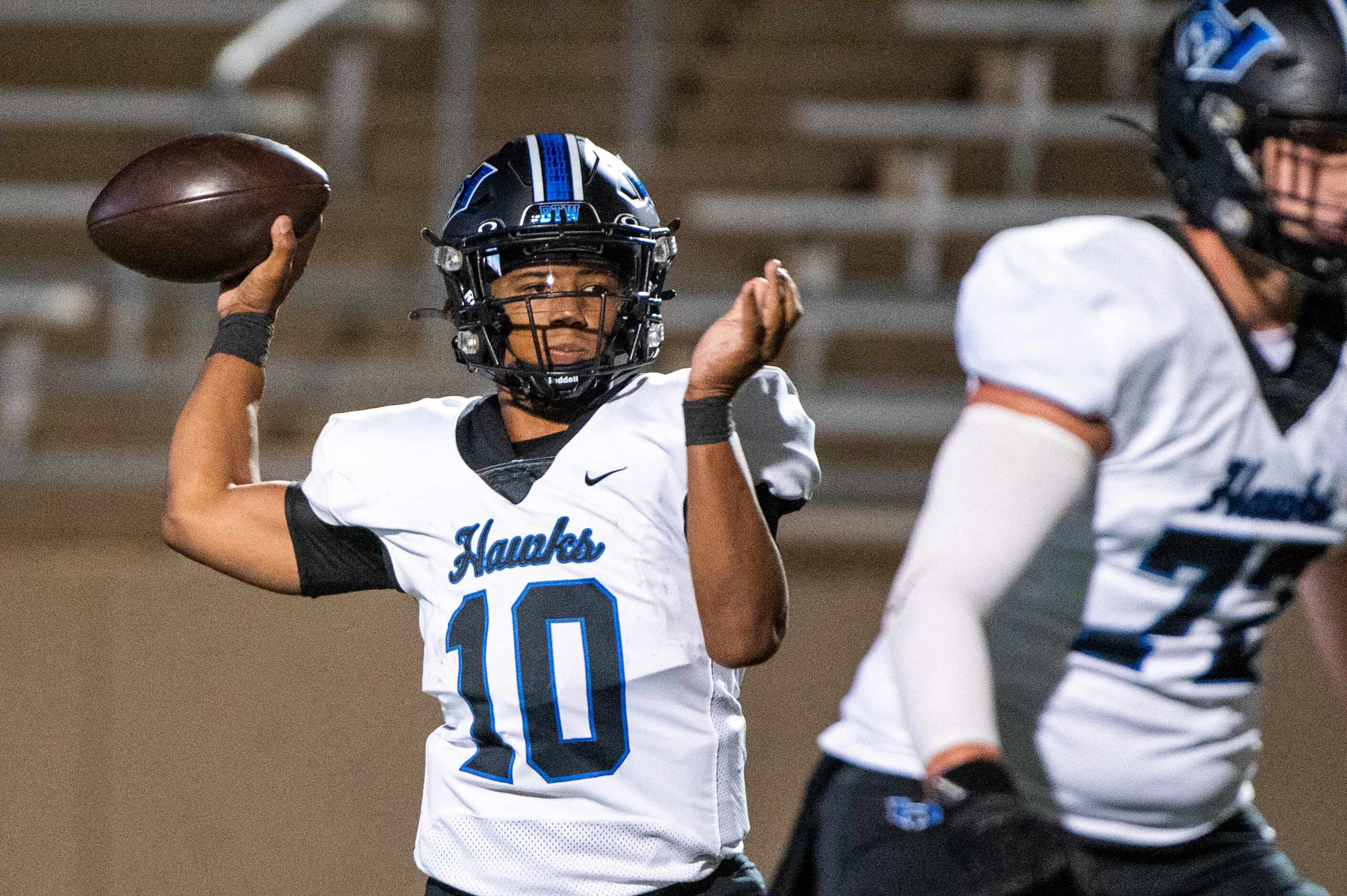 Hebron's Patrick Crayton Jr (10) throws a pass in the first half during a high school...