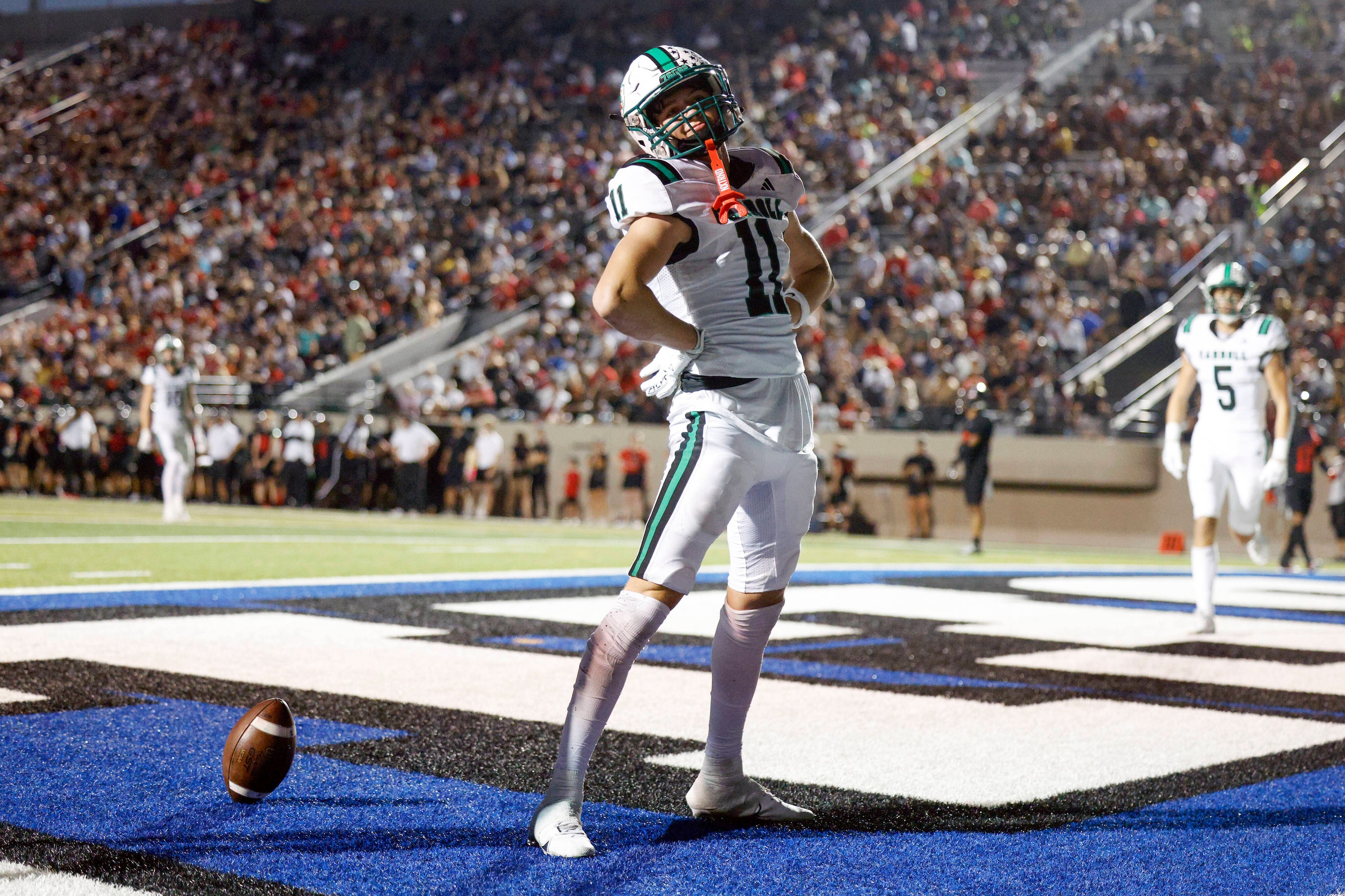 Southlake Carroll wide receiver Brock Boyd (11) celebrates after catching a pass for a...