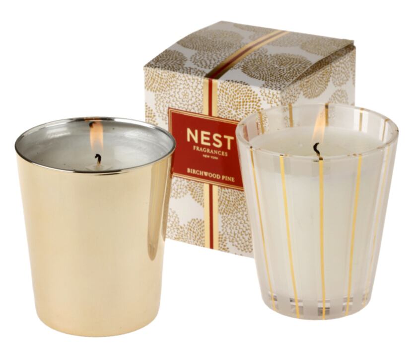 Enjoy the festive aroma of the holidays with soy-blend candles from Nest in 8.1-ounce...