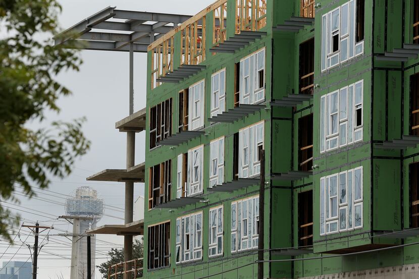 Widespread apartment construction in the Dallas-area is keeping landlords from big rent hikes.