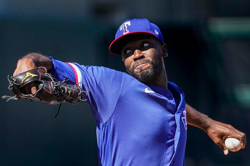Texas Rangers pitcher Taylor Hearn delivers during the third inning of a spring training...