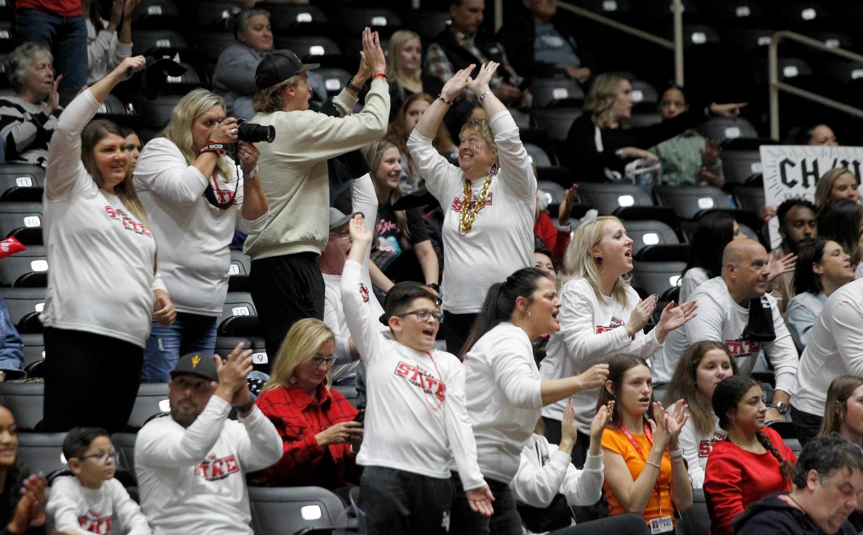 Colleyville Heritage fans react after a score during the second set of their match against...