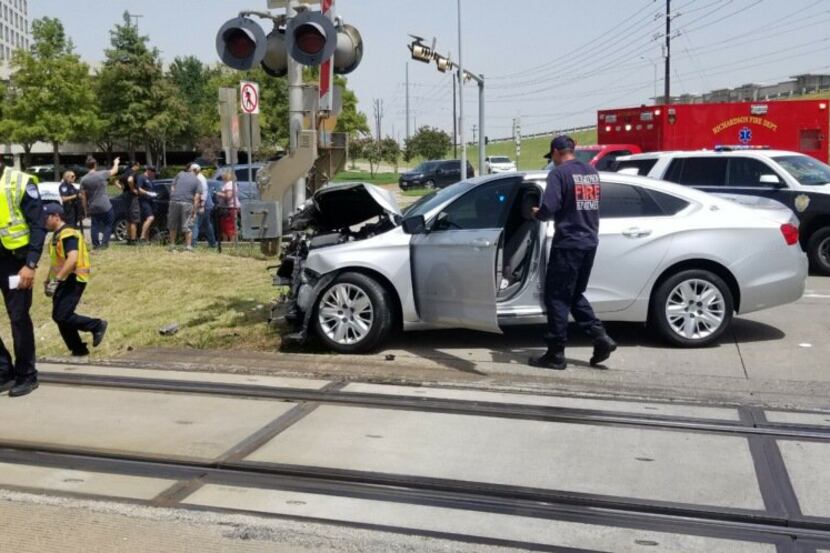 A crash involving a car and DART Red Line train is causing a 15-minute travel delay.