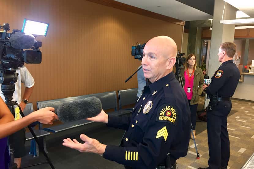 Dallas Police Sgt. Robert Munoz answers questions about the new immigration law to combat...