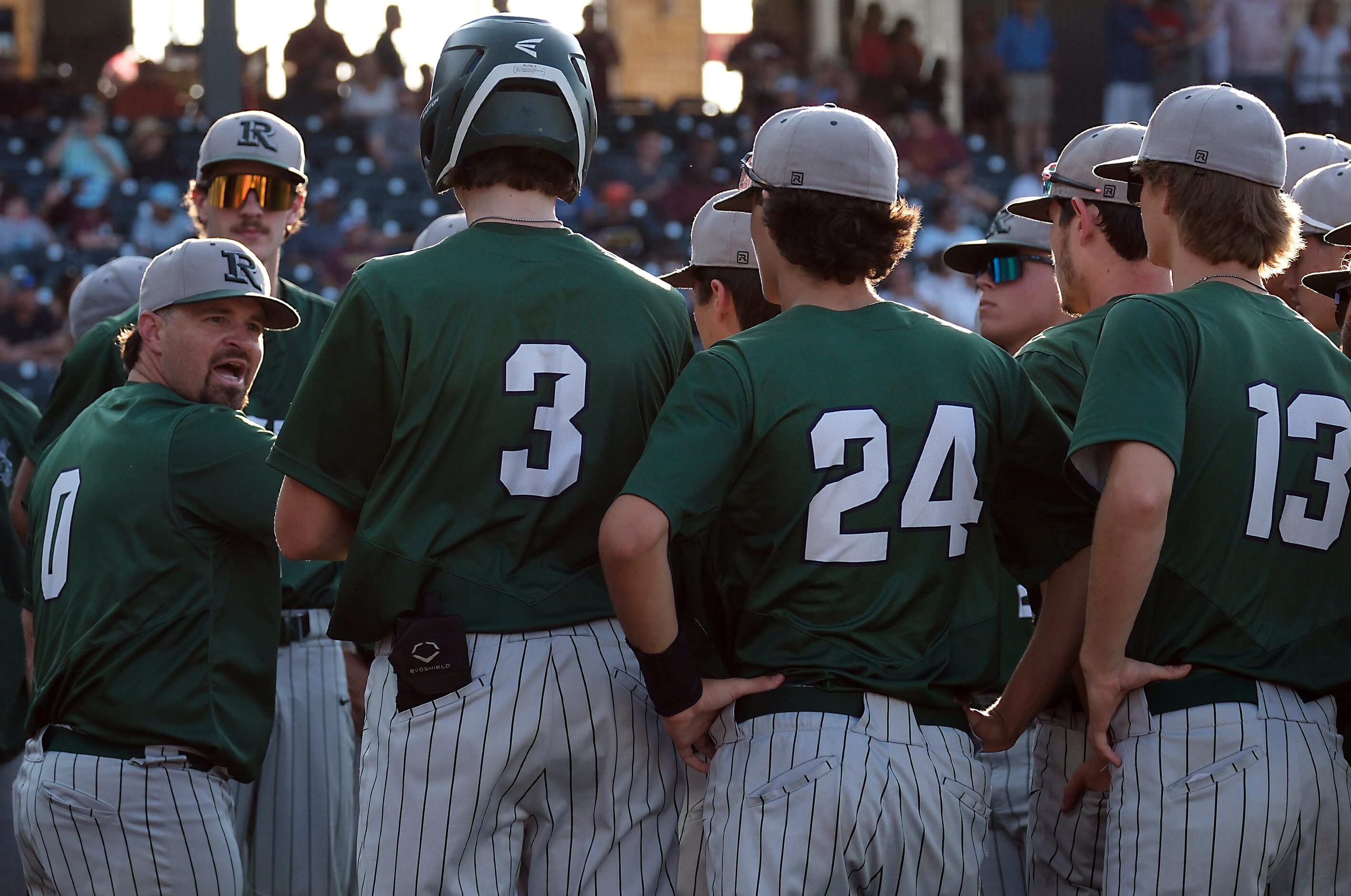 Frisco Reedy head coach, Mickey Sepanek, (0), left, tries to rally his team in the 7th...