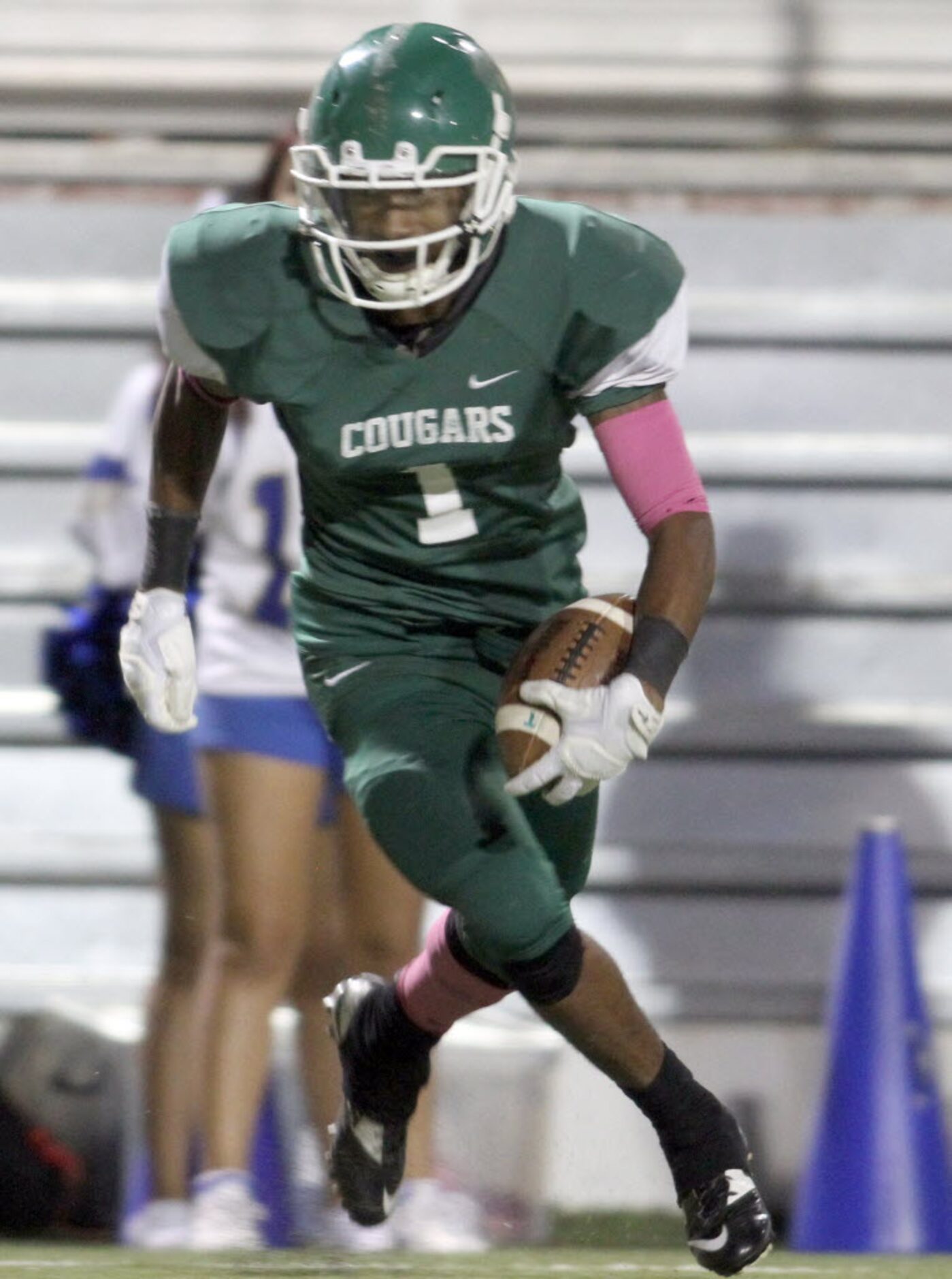 Bryan Adams receiver Nathan Stewart (1) reverses his field as he tacks on extra yardage...