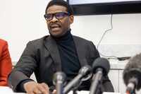 Michael Irvin speaks at a press conference at the Regency Plaza in Dallas on Tuesday, March...