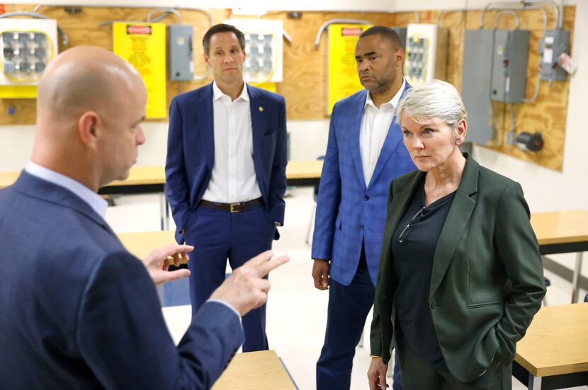 Energy Secretary Jennifer Granholm (right) listend to IBEW Local 20 Assistant Business...