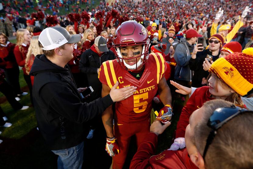 Iowa State wide receiver Allen Lazard (5) celebrates with fans after they defeated TCU 14-7...