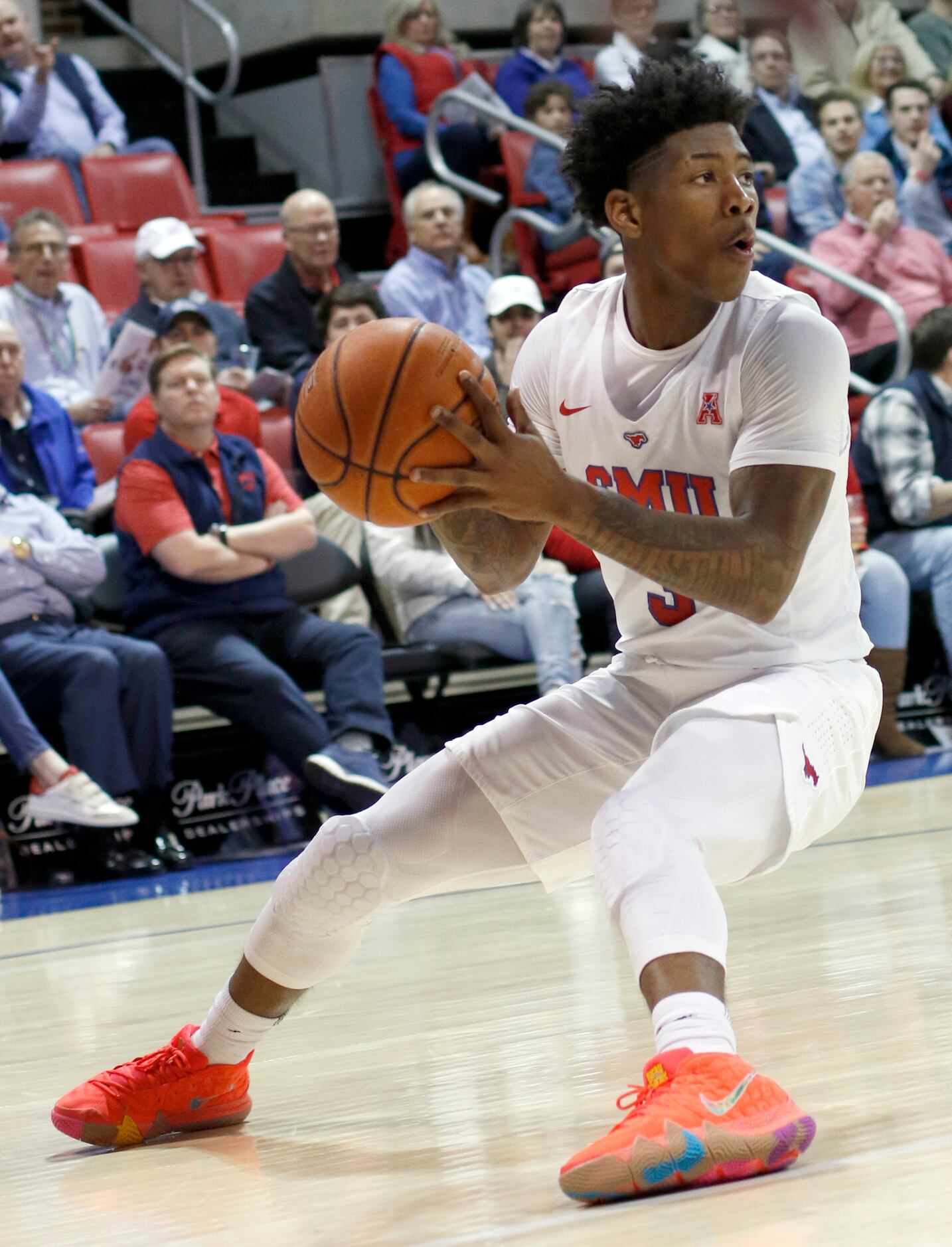 SMU guard Kendrick Davis (3) pumps the brakes as he looks to pass during first half action...