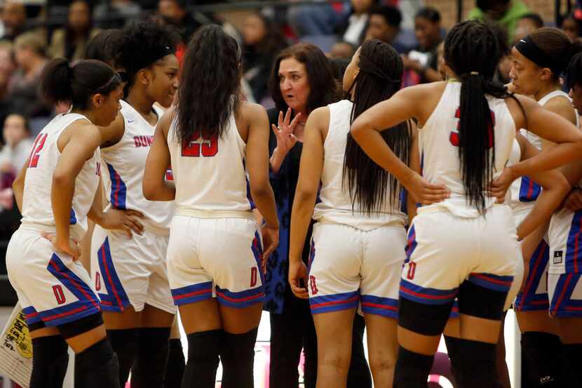 Duncanville head coach Cathy Self-Morgan coaches her players during a second half timeout of...