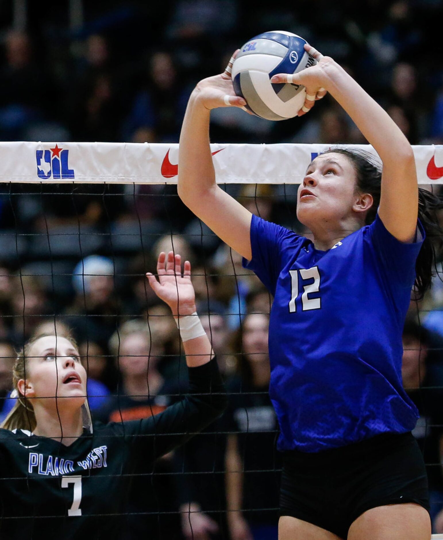 Trophy Club Byron NelsonÃs Avery Lowe (12) sets a teammate up in the second set of a class...