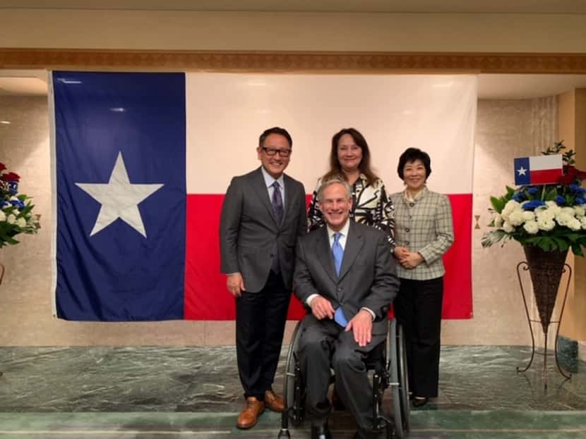 Texas Gov. Greg Abbott met on Wednesday in Tokyo with Toyota Motor Corp. president and chief...